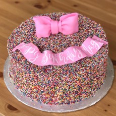 Nonperil Sprinkle Cake with Bow + Banner